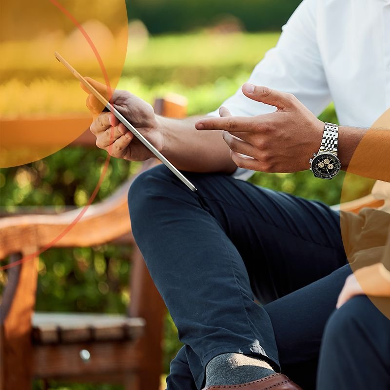 Man reviewing a mind map on a tablet